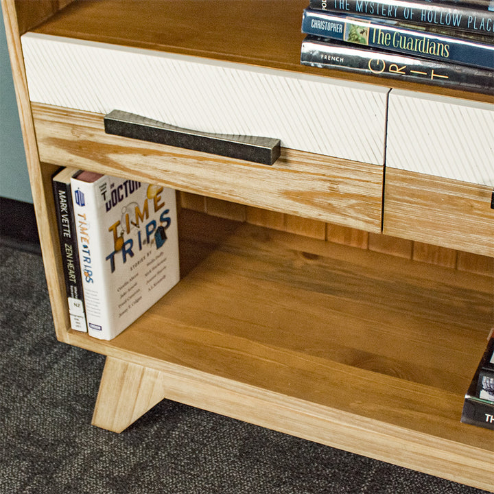 An overall view of the lower shelf on the Soho Short Display Shelf.