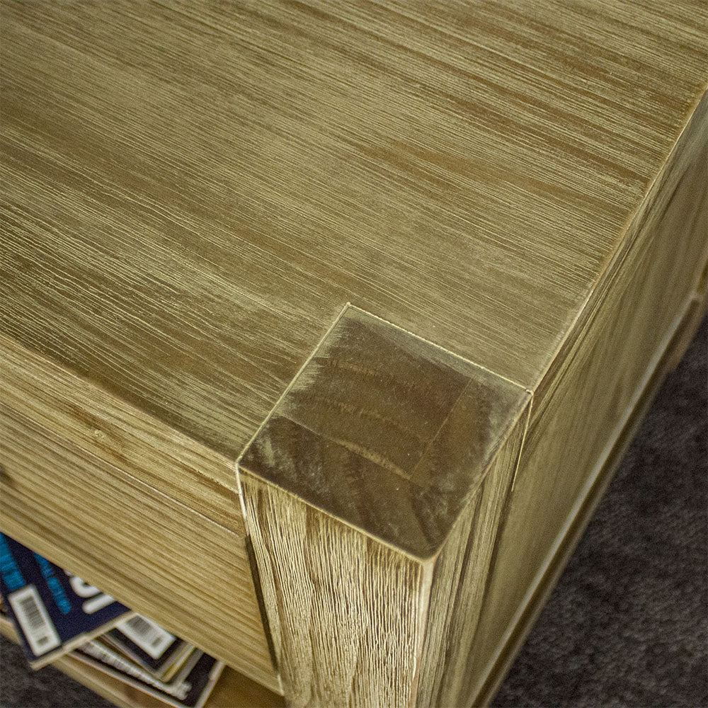 A close up of the top of the Vancouver 1 Drawer Lamp Table, showing the wood grain and colour.