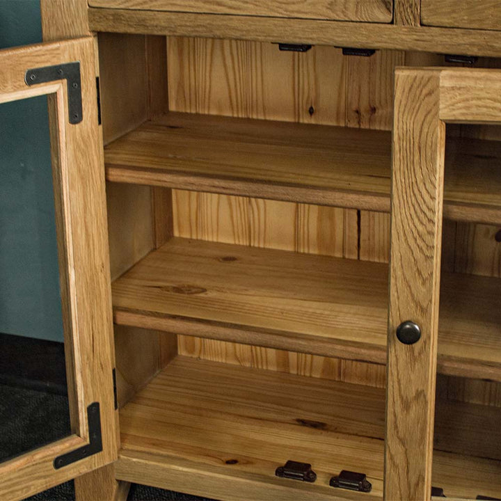 An overall view of the shelving on the Vancouver Value 2 Drawer 2 Door Oak Sideboard.