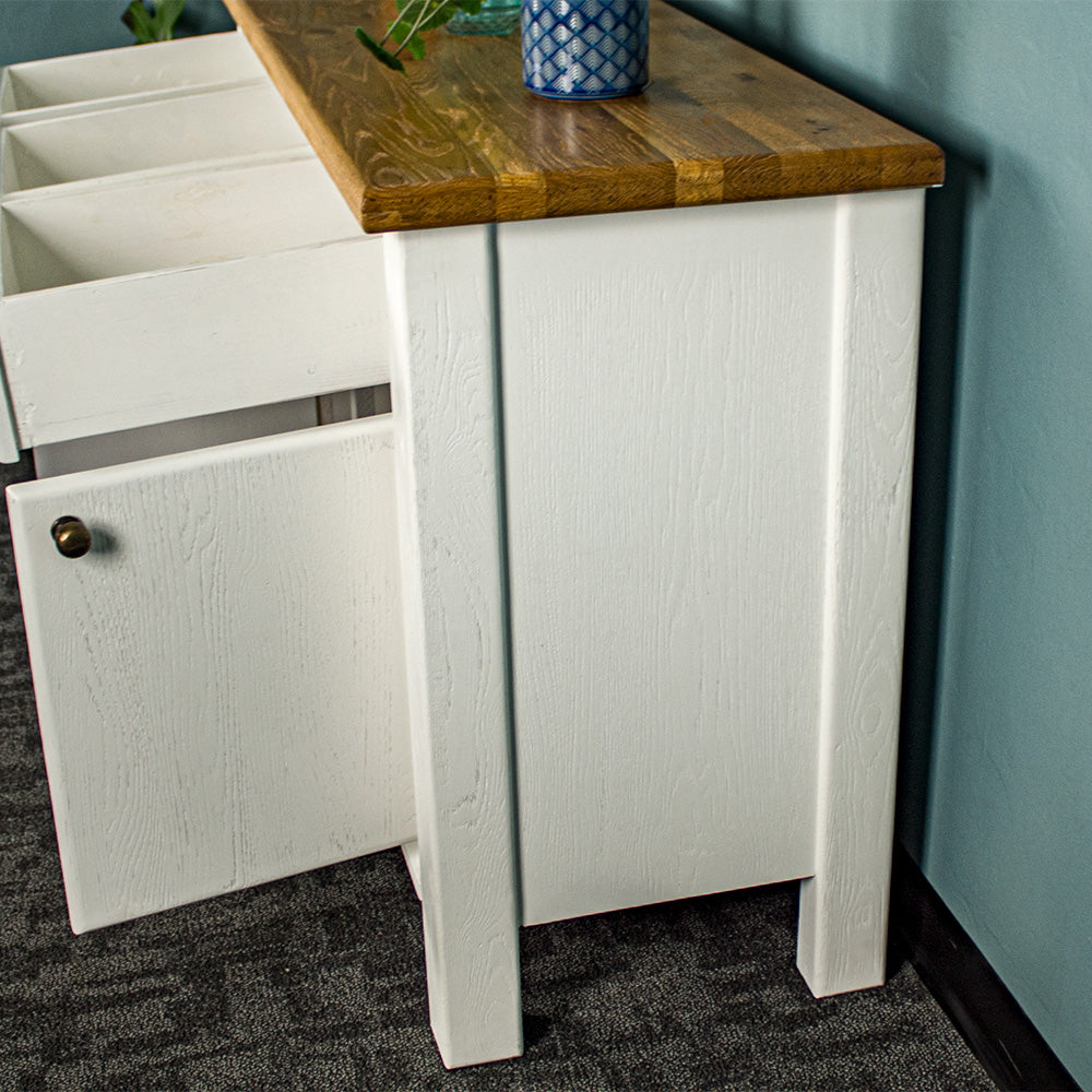 A view of the side of the Loire Two-Tone Medium Oak Buffet.