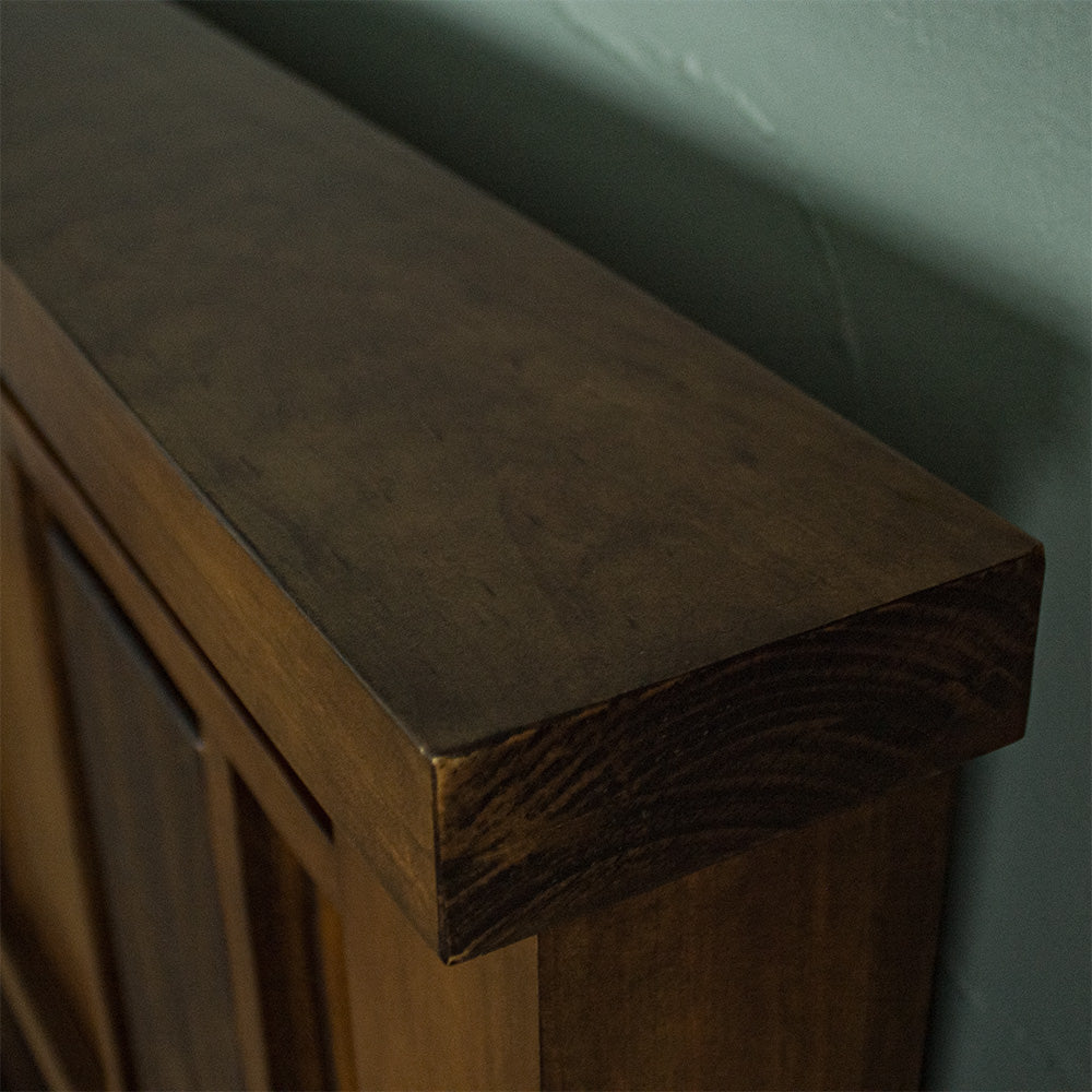 A close up of the top of the Botanica King Slat Bed Frame, showing the wood grain and colour.