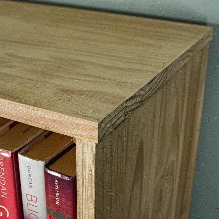 A close up of the top of the Soho Medium Bookcase, showing the wood grain and colour.