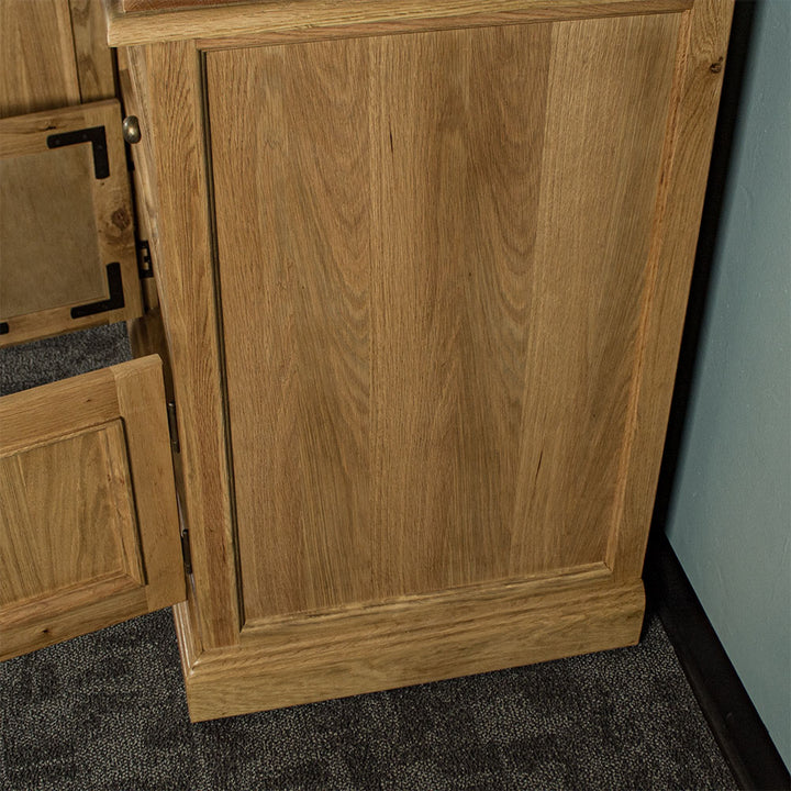 The side of the Versailles Large Oak Buffet, showing the wood grain.