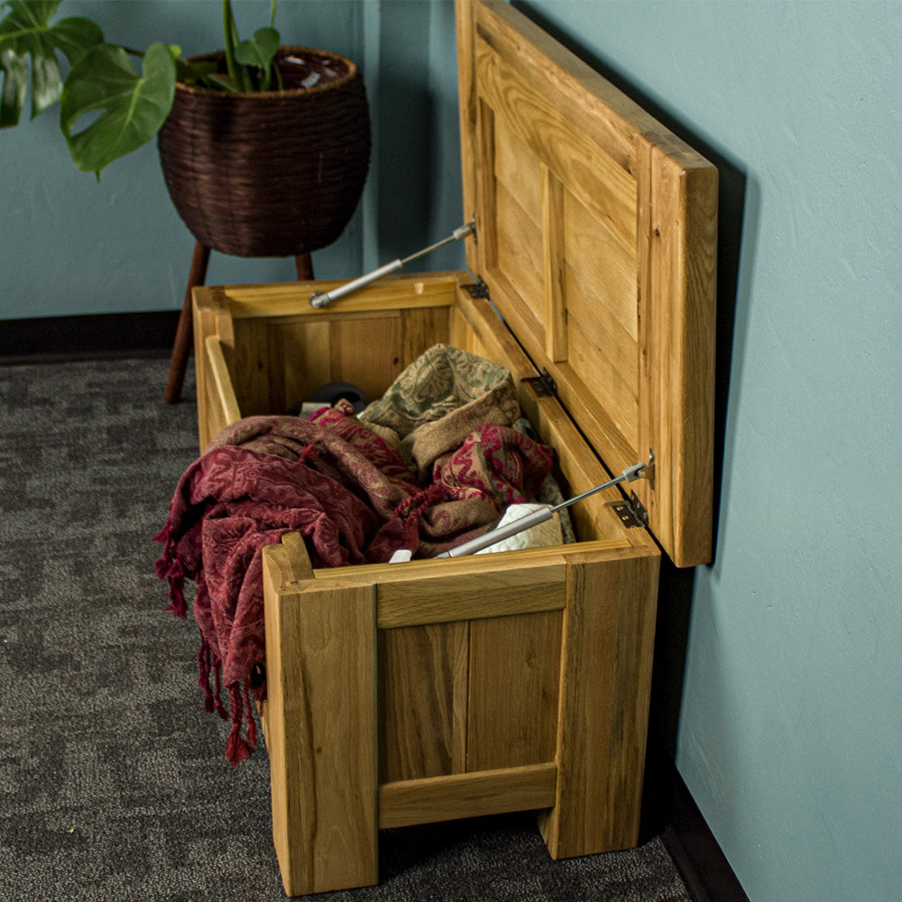 A view from the side of the Camden Oak Blanket Box