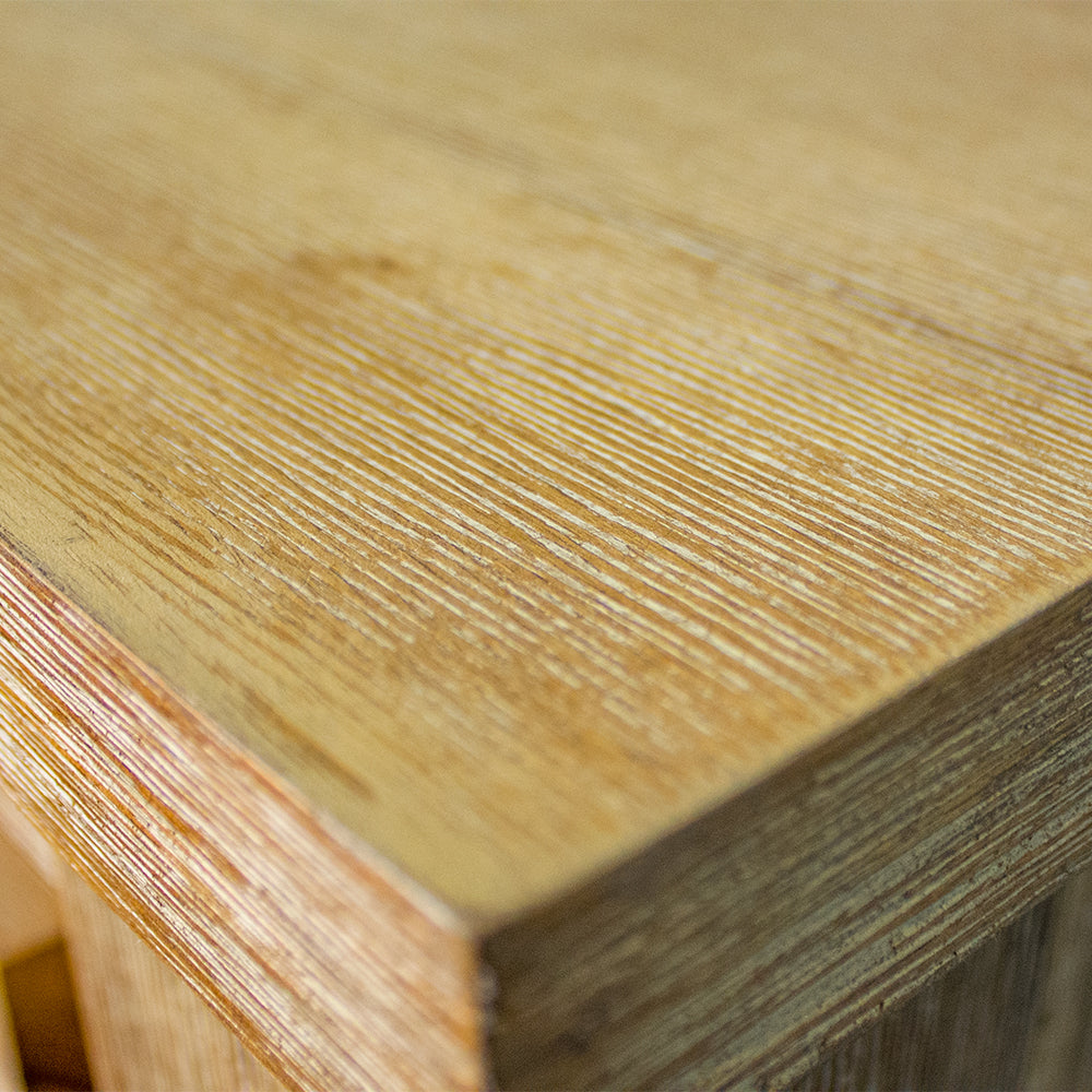 A close up of the top of the Mars Two-Drawer Bedside Cabinet, showing the wood grain and colour.